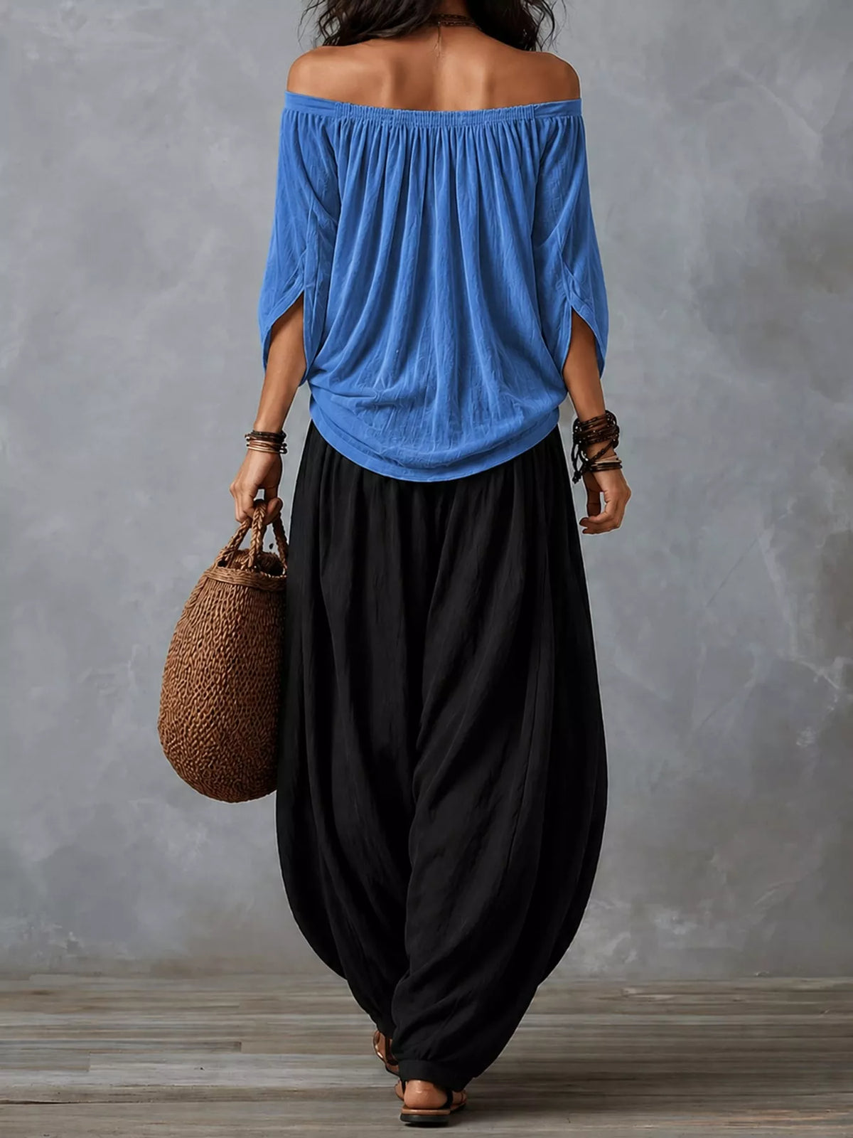 Blue top and black pants off-shoulder top and wide-leg harem pants set — back view