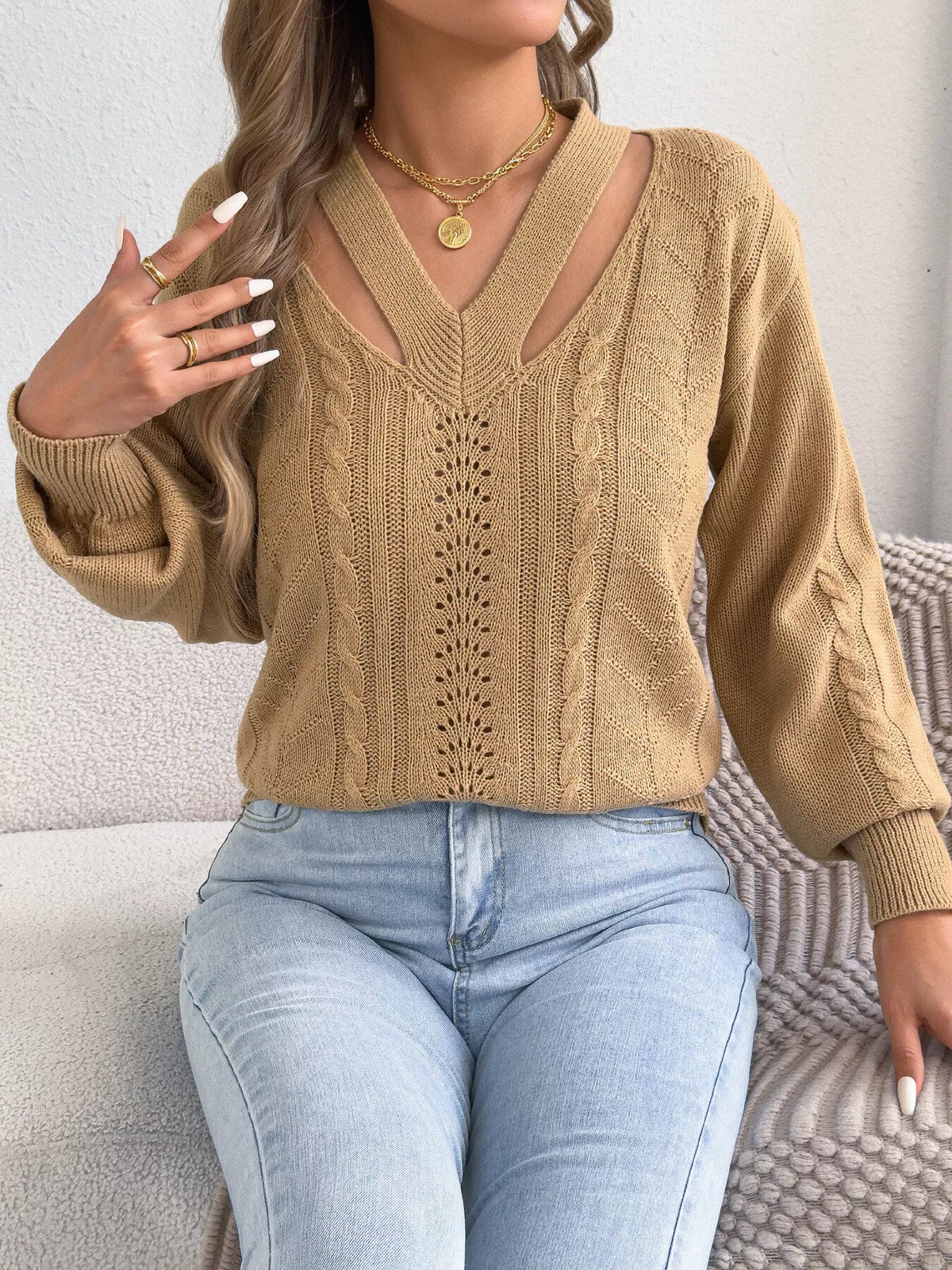 Tan cut-out cable knit sweater
