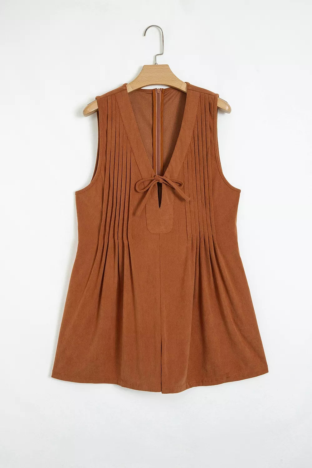 Rust brown corduroy romper, hanging front view