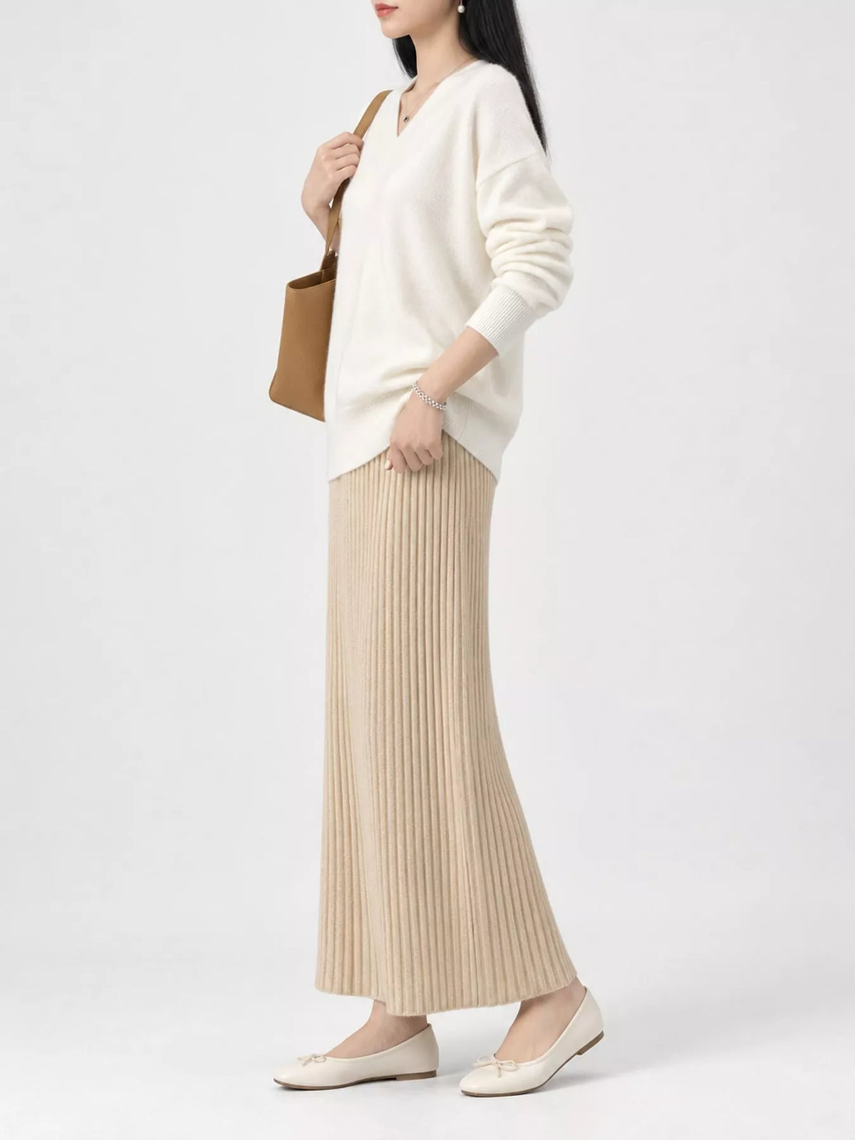Cream wrap-front sweater, side view