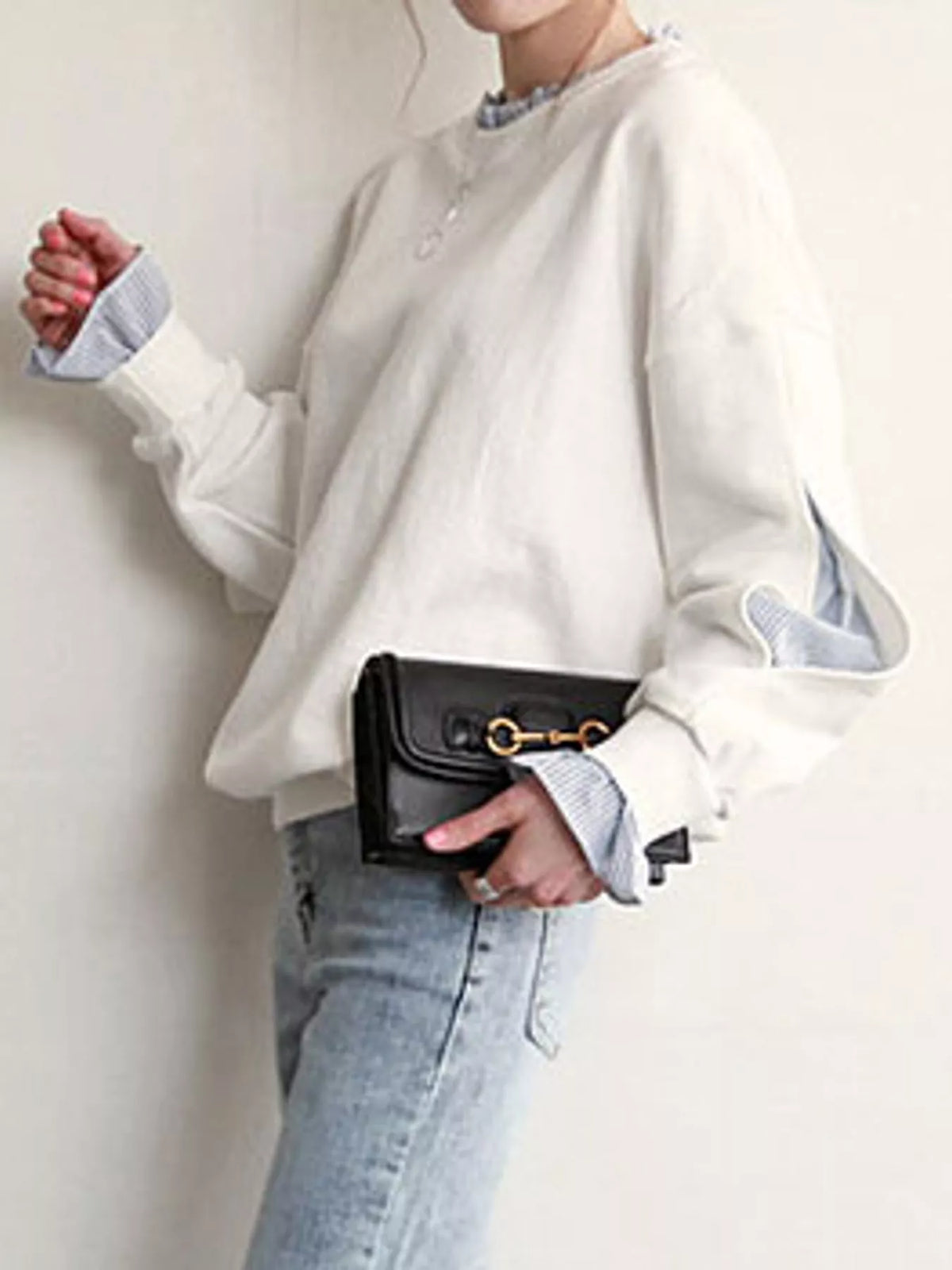 White crewneck sweatshirt with striped ruffle cuffs