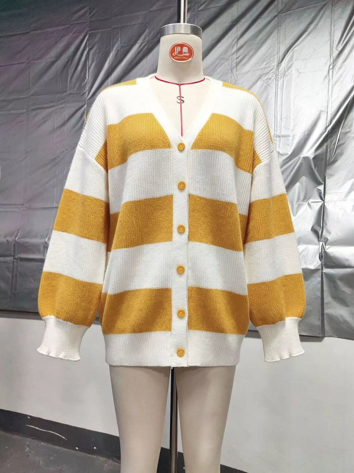 Striped cardigan, mustard and white mannequin front