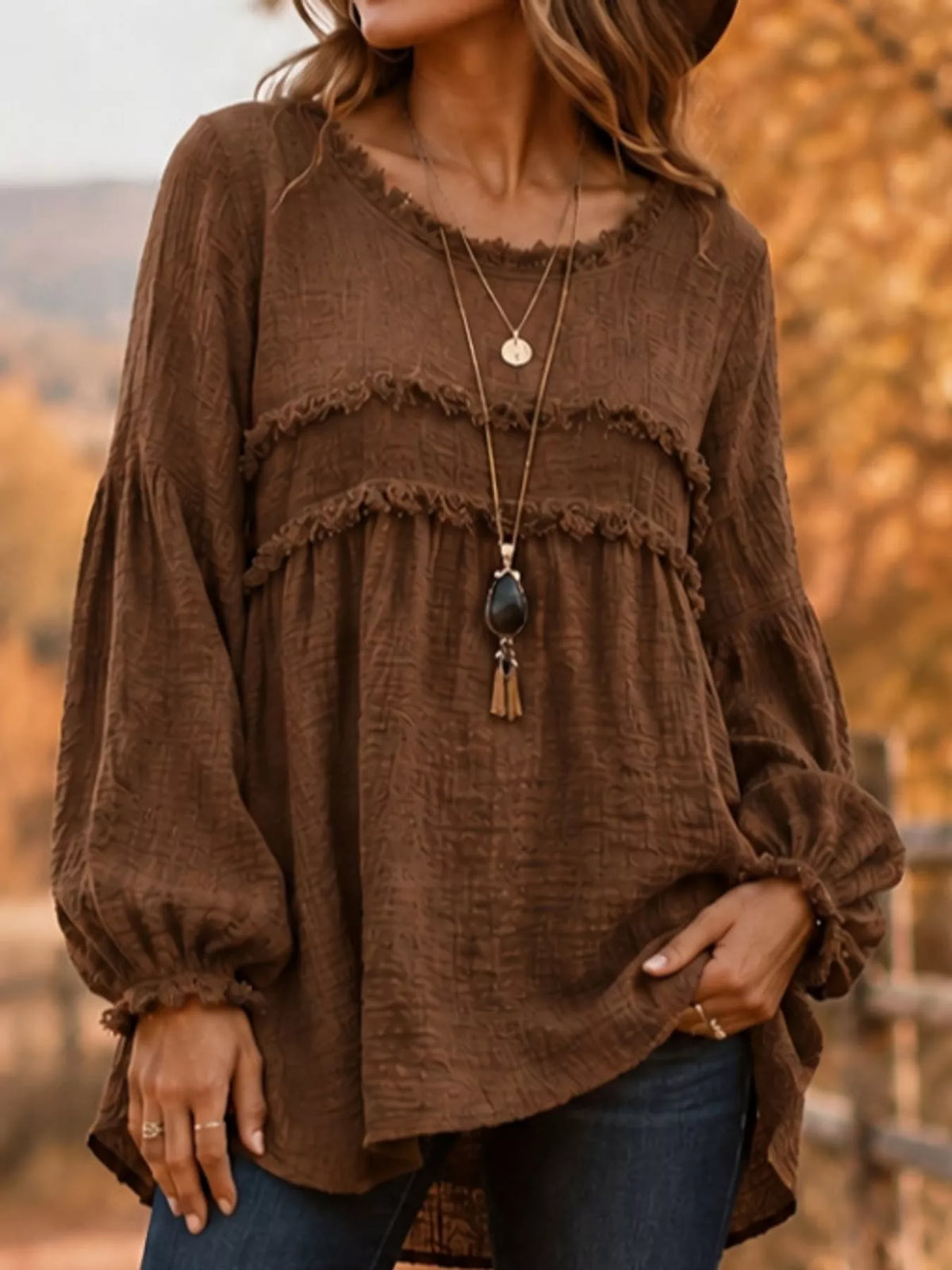 Brown textured frayed-trim peplum blouse