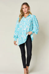 Trendsi Double Take Full Size Printed Smocked Long Sleeve Blouse Plus Size -