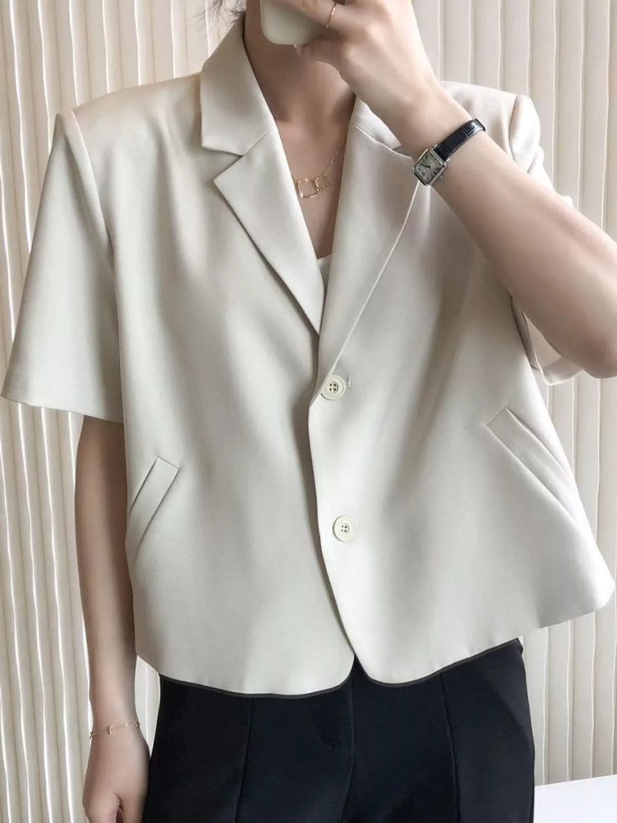 Collared short sleeve blazer, front view on model