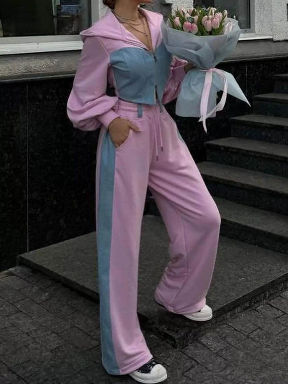 Pink and blue color-block zip-up hoodie and wide-leg pants set — side view