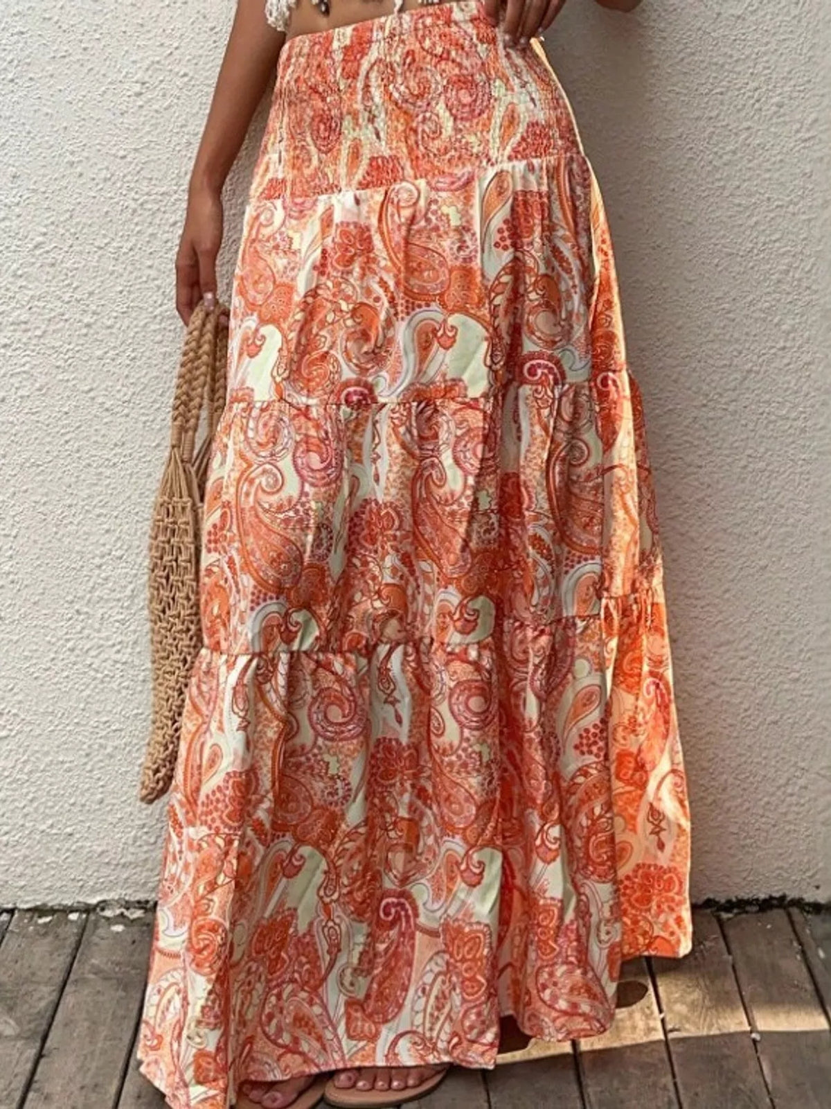 Women's Paisley Print Tiered Maxi Skirt in orange and cream — front view