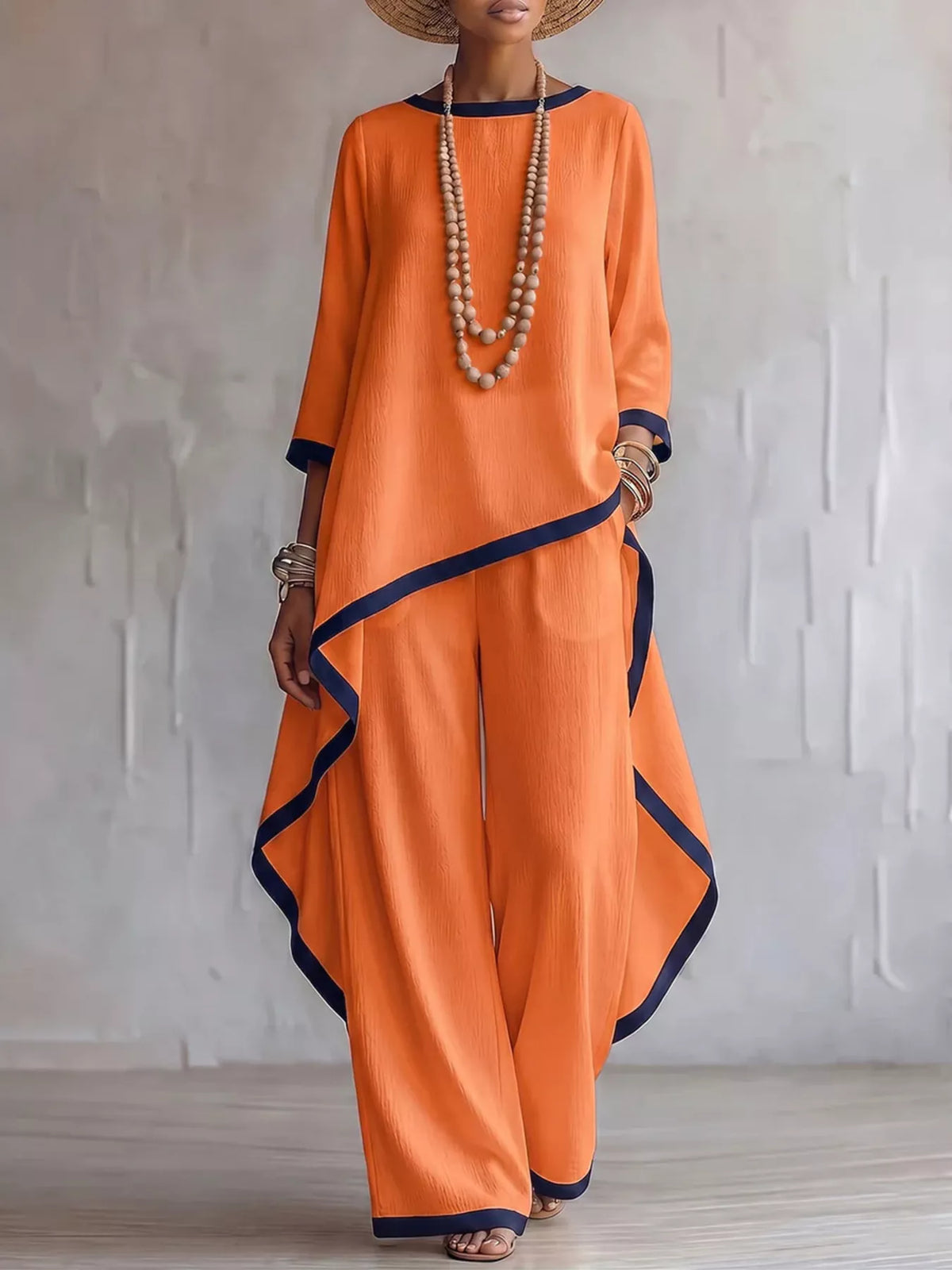 Orange contrast-trim top and pants set, front view