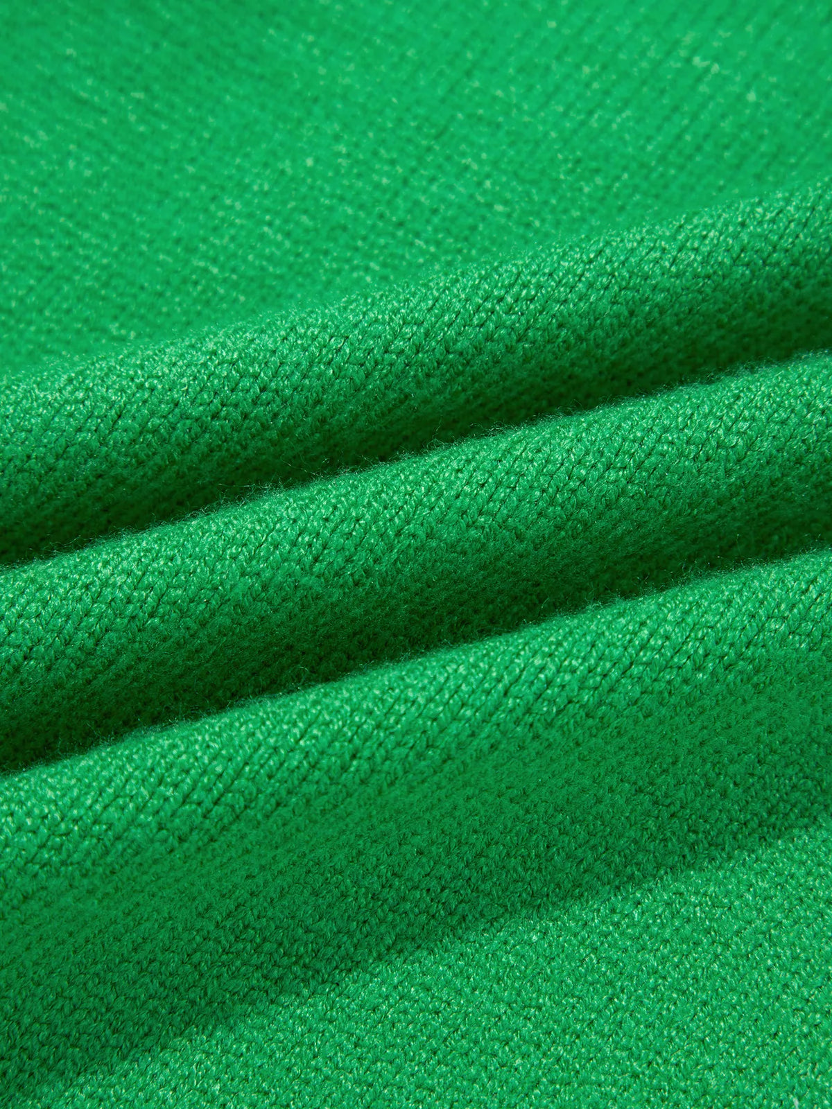 Christmas patch sweater, green knit close up