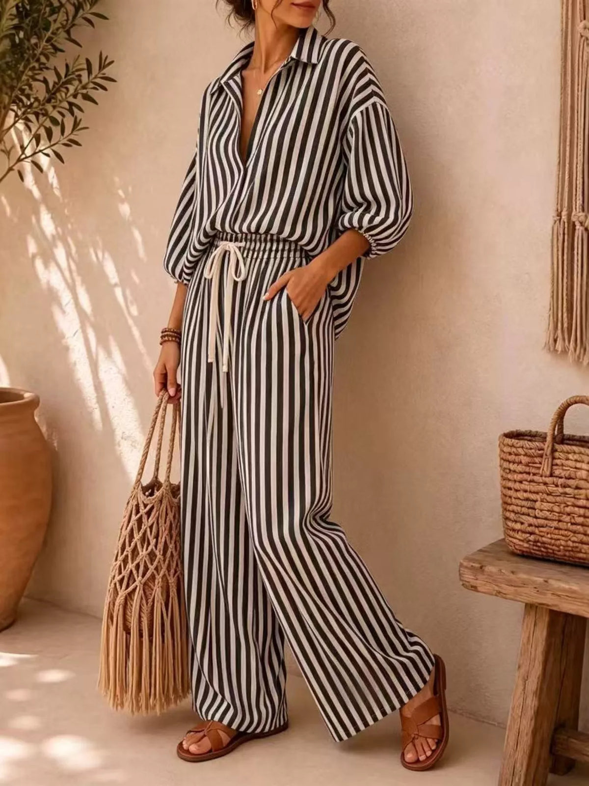 Black and white striped shirt and drawstring pants set, full front view