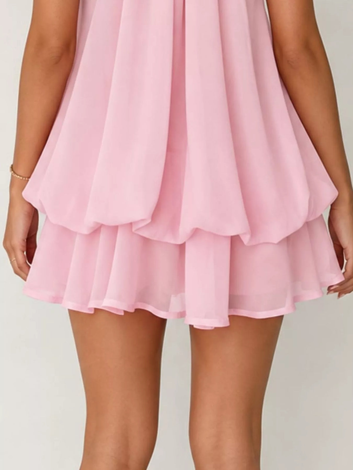 Pink halter neck chiffon mini dress, layered hem detail