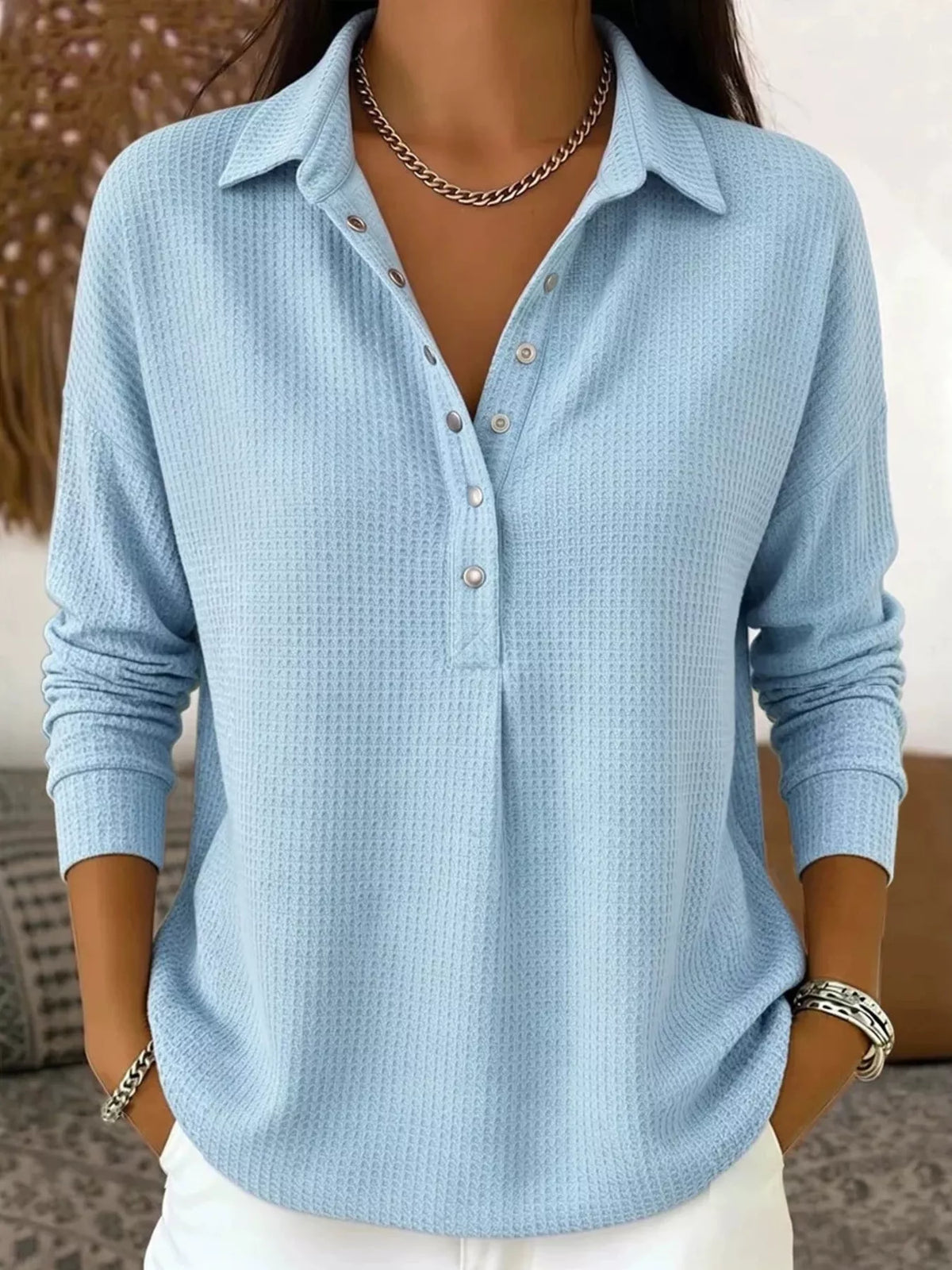 Light blue waffle knit snap-front blouse