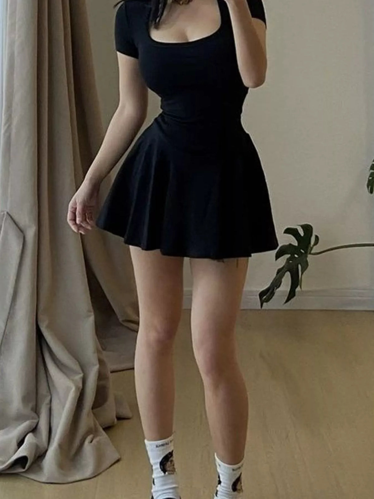 Black short-sleeve mini dress