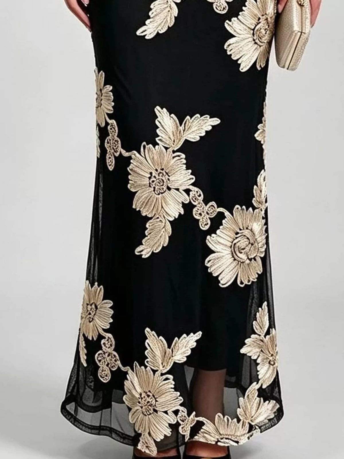 Black floral one-shoulder maxi dress, sheer hem detail