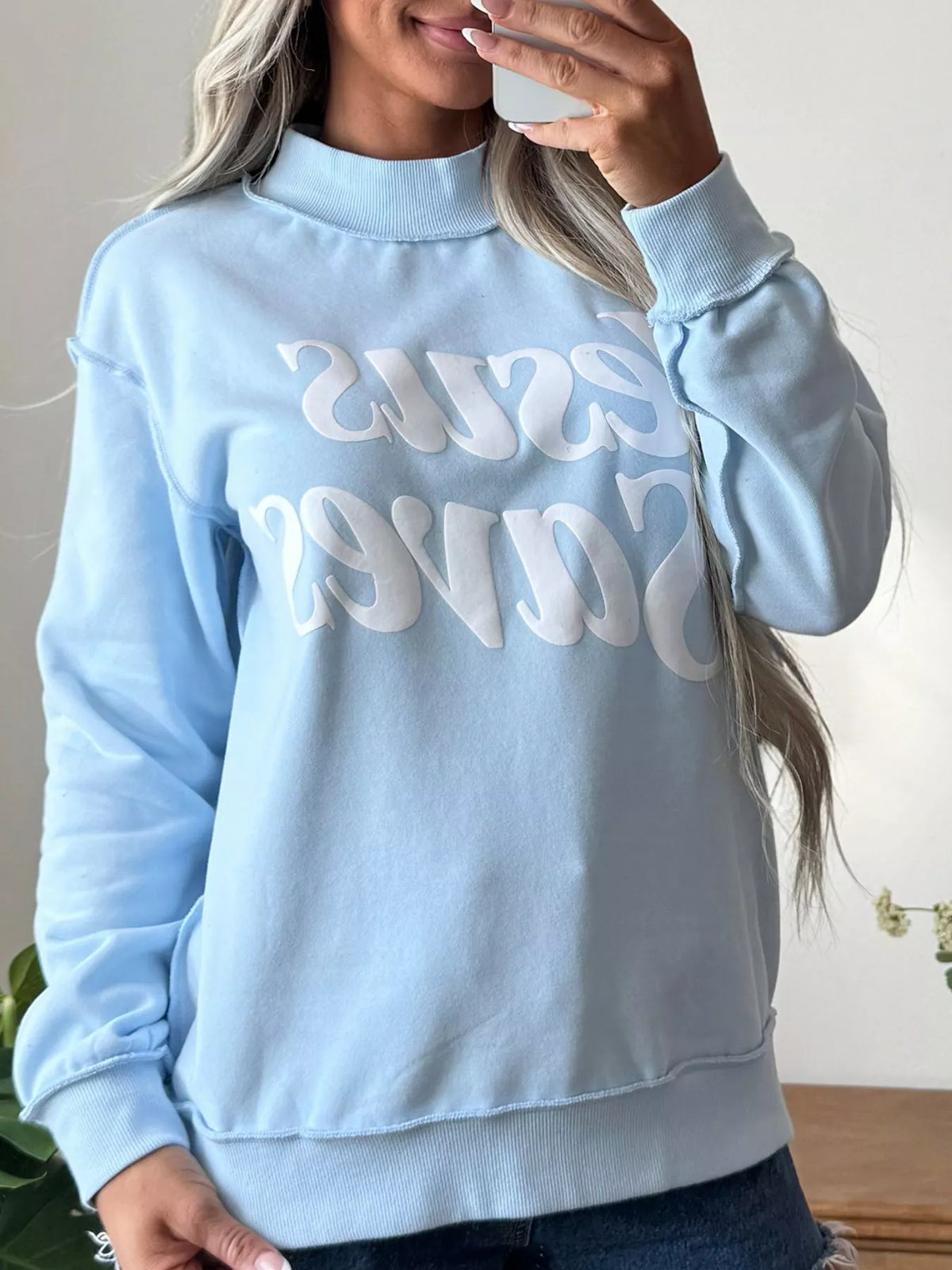 Light blue jesus saves stand neck oversized sweatshirt — front view