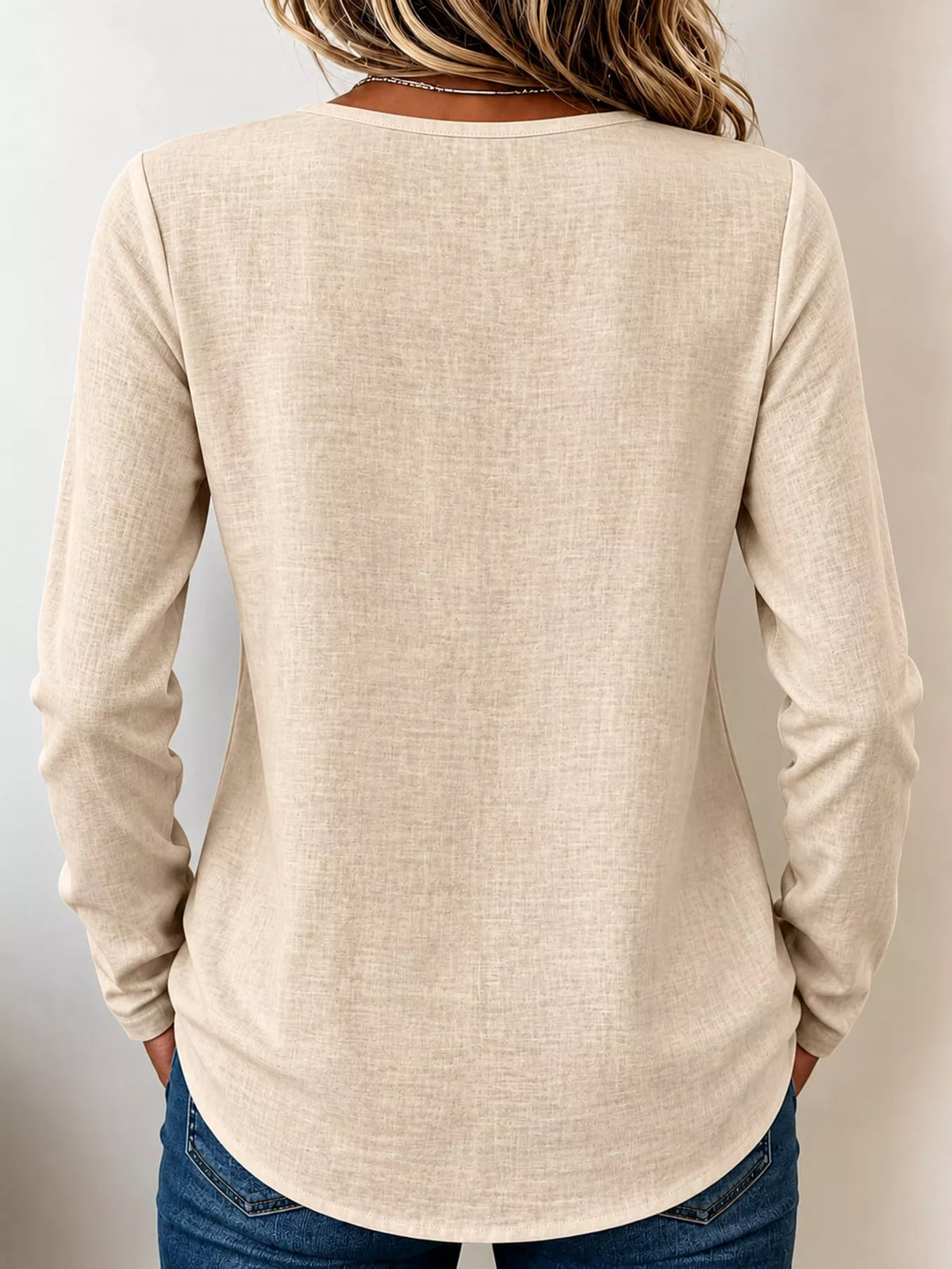 Apricot long sleeve decorative button blouse, back view