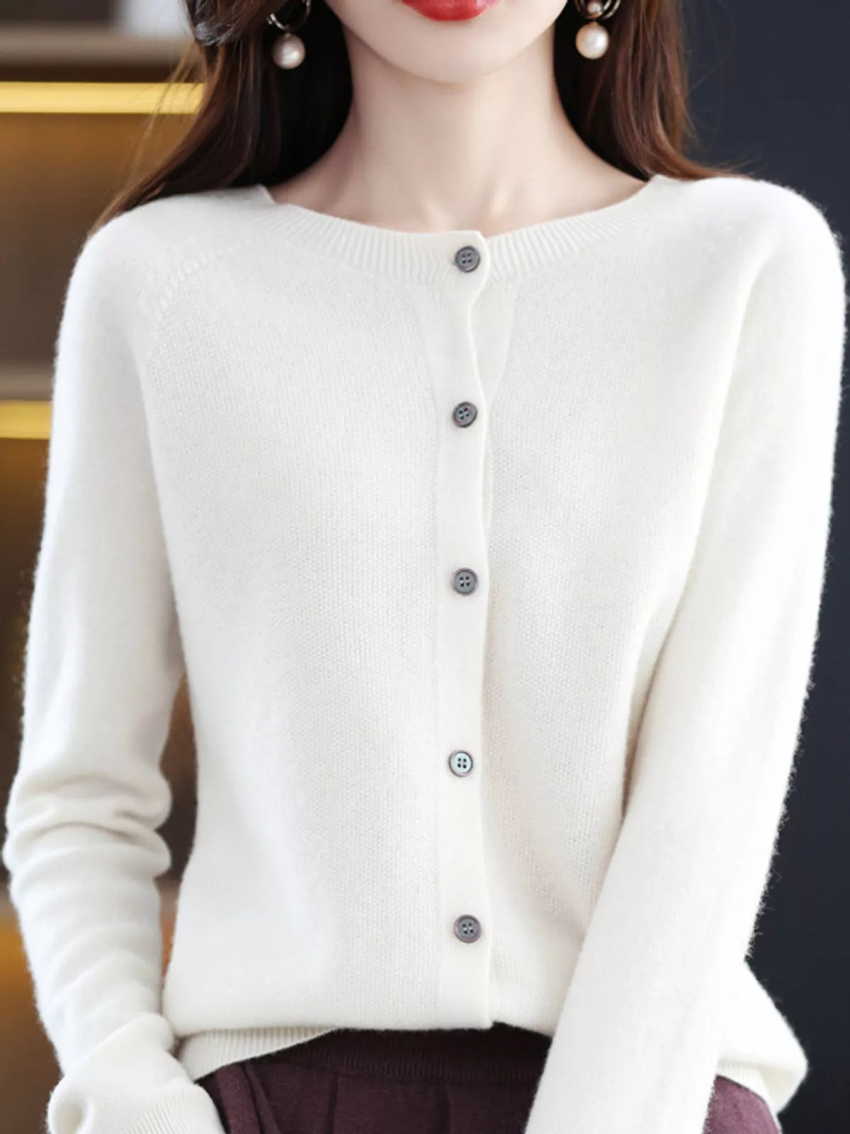 Round neck long sleeve cardigan, front view on model