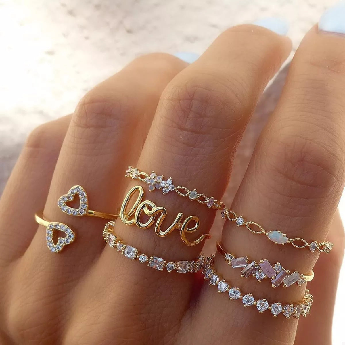 Trendsi 7 Piece 18K Gold-Plated LOVE Zircon Ring Set -