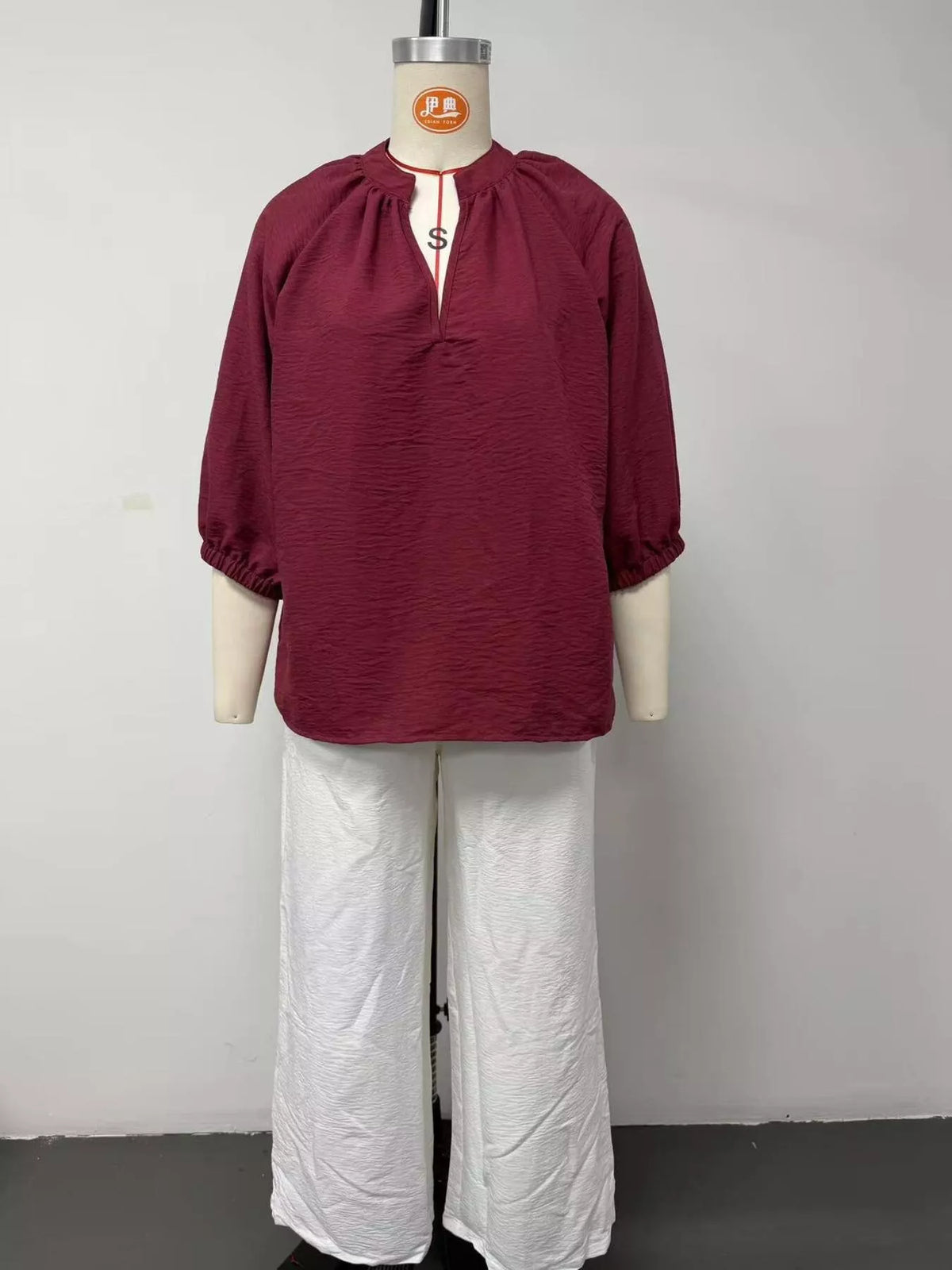 Burgundy Notched Long Sleeve Blouse & White Wide-Leg Pants Set mannequin front view
