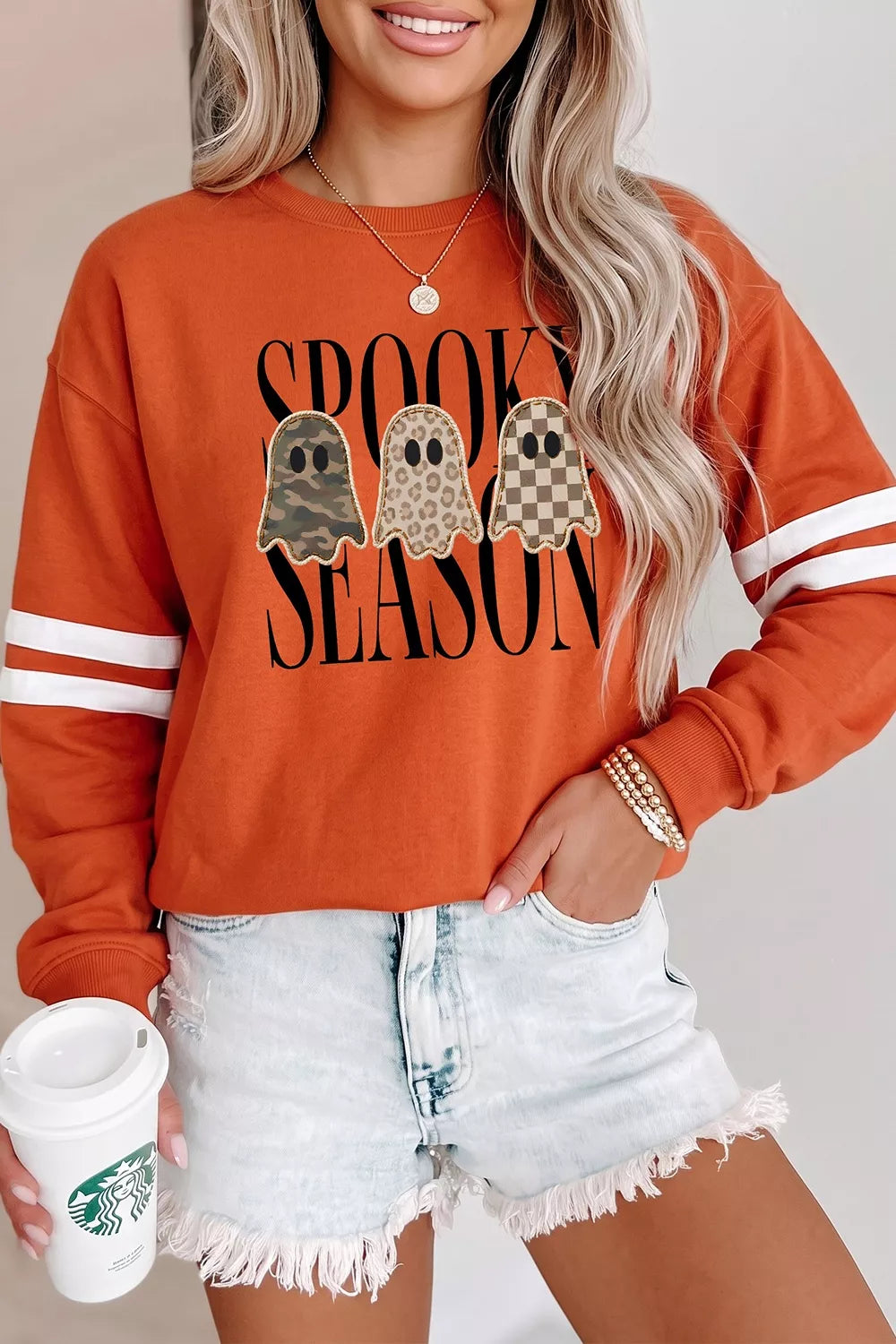 Spooky Season Ghost Striped Sleeve Sweatshirt in orange, front view