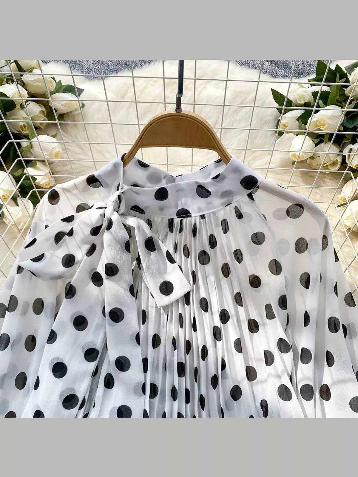 White polka dot long sleeve blouse, back view