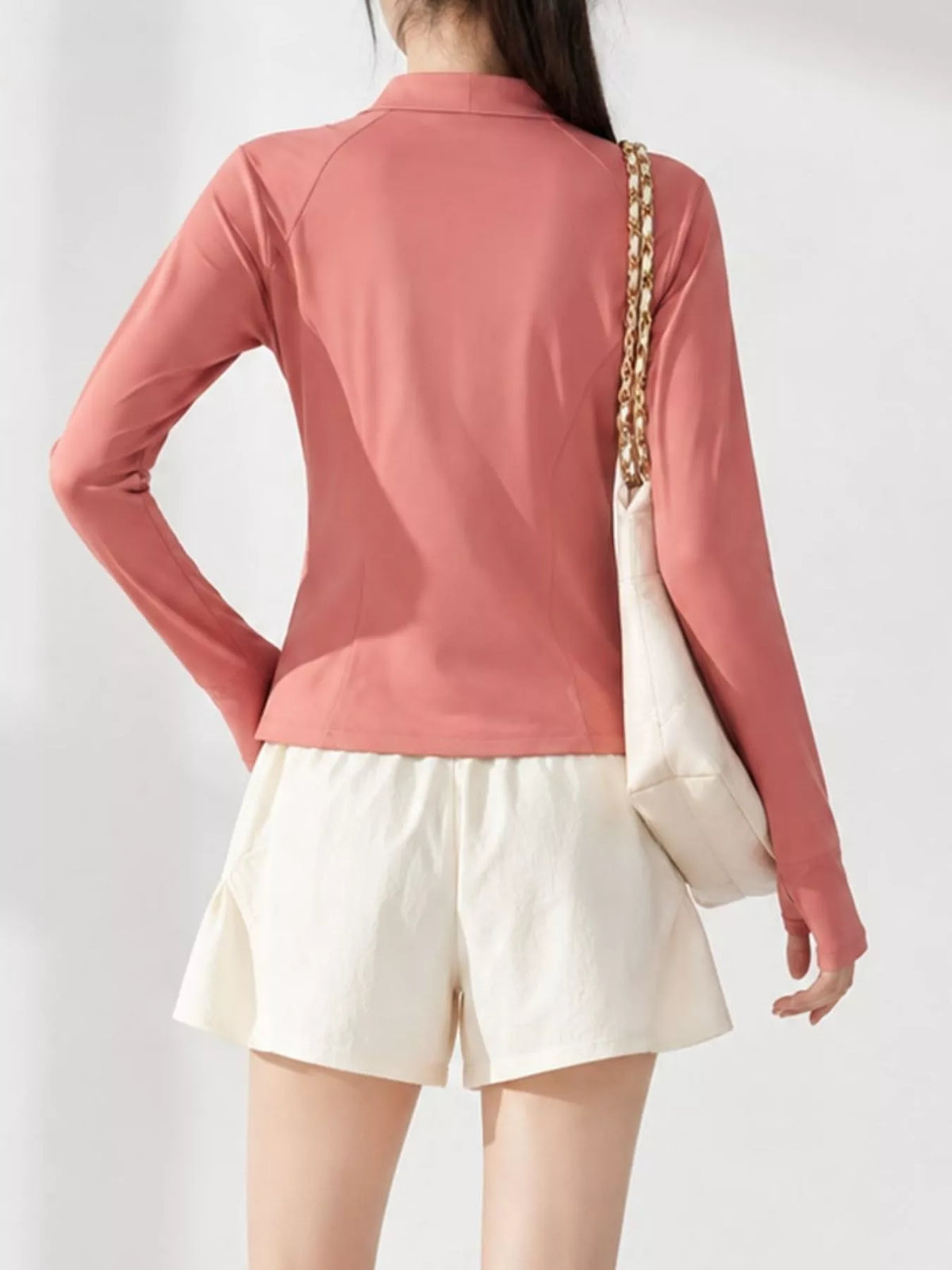 Pink quick-dry zip-up jacket, back view