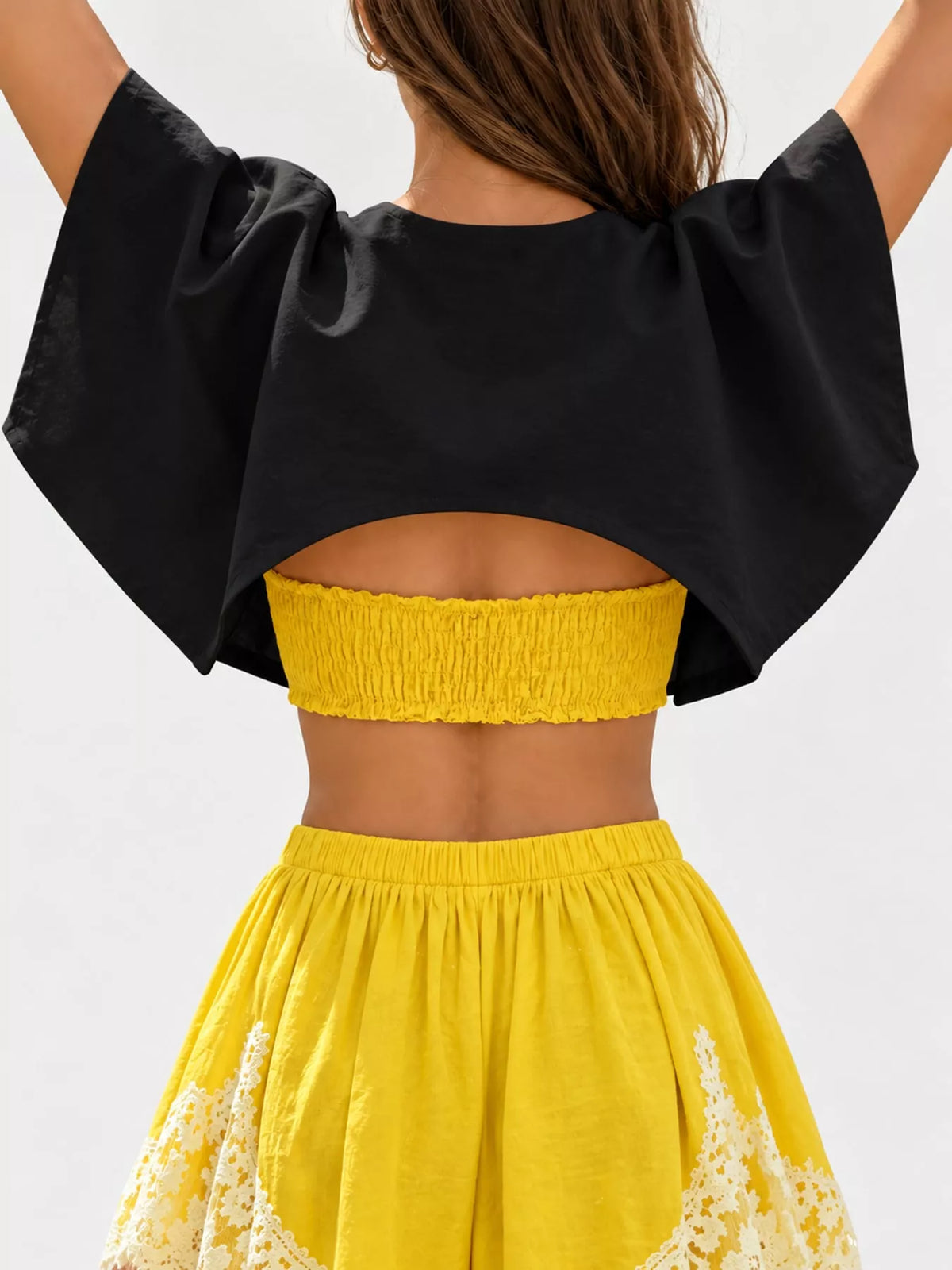 Black single button closure cropped cape