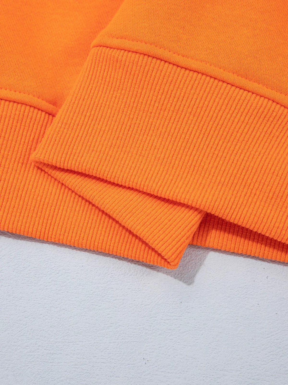 Orange gingham sleeve slogan sweatshirt, detail view