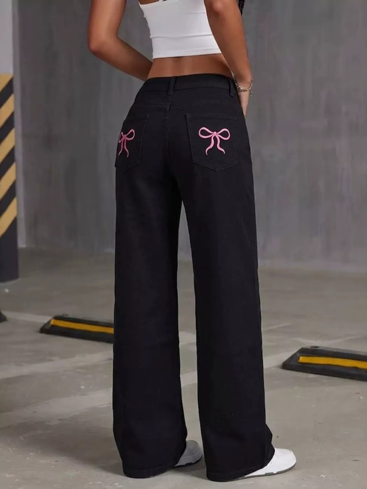 High-Waisted Bow Detail Wide-Leg Jeans in black, back view
