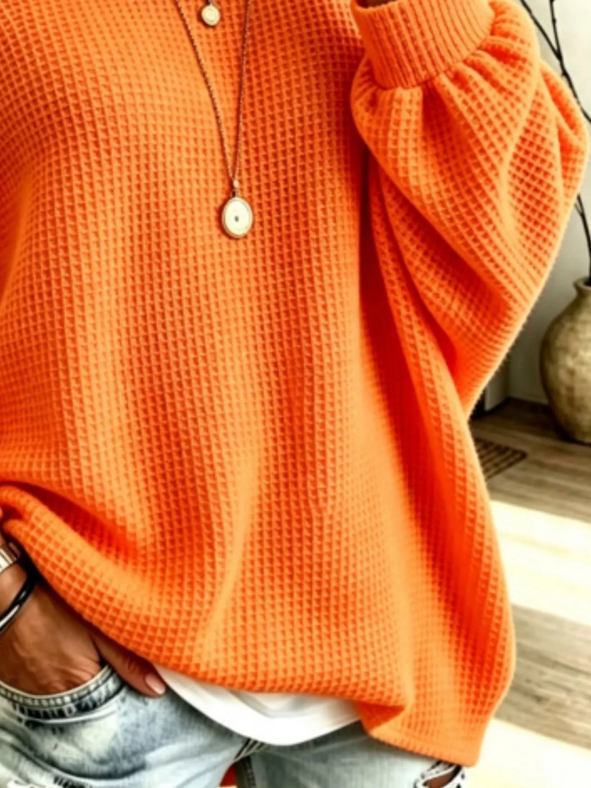 Women's Waffle Knit Boat Neck Sweatshirt in orange — texture detail view