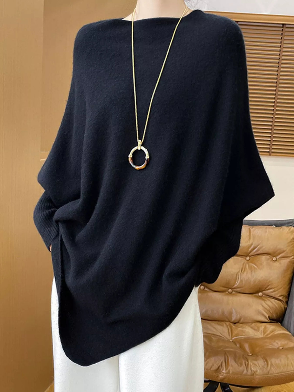 Navy asymmetrical lantern sleeve sweater — front view