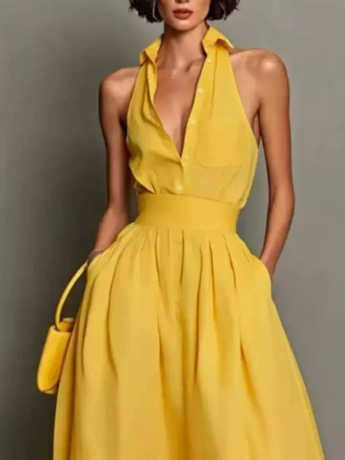Yellow halter-collar A-line midi dress, collar and bodice detail