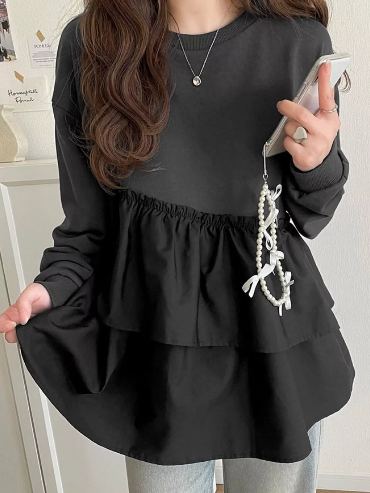 Black color-block ruffled hem top