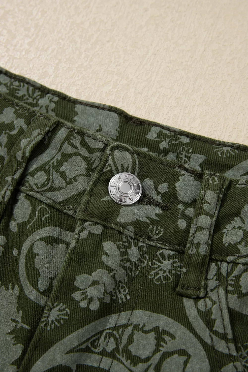 Green paisley print harem denim pants, button and belt loop detail