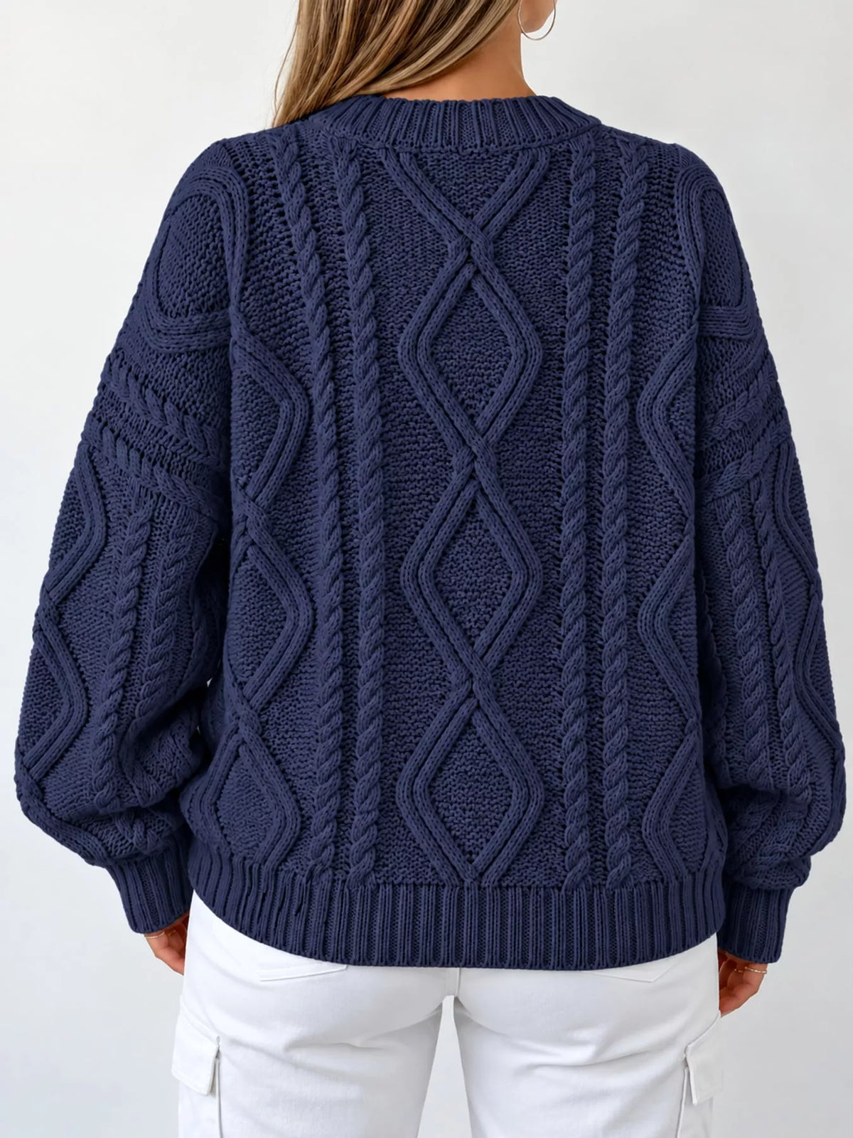 Navy cable-knit round neck sweater, back view