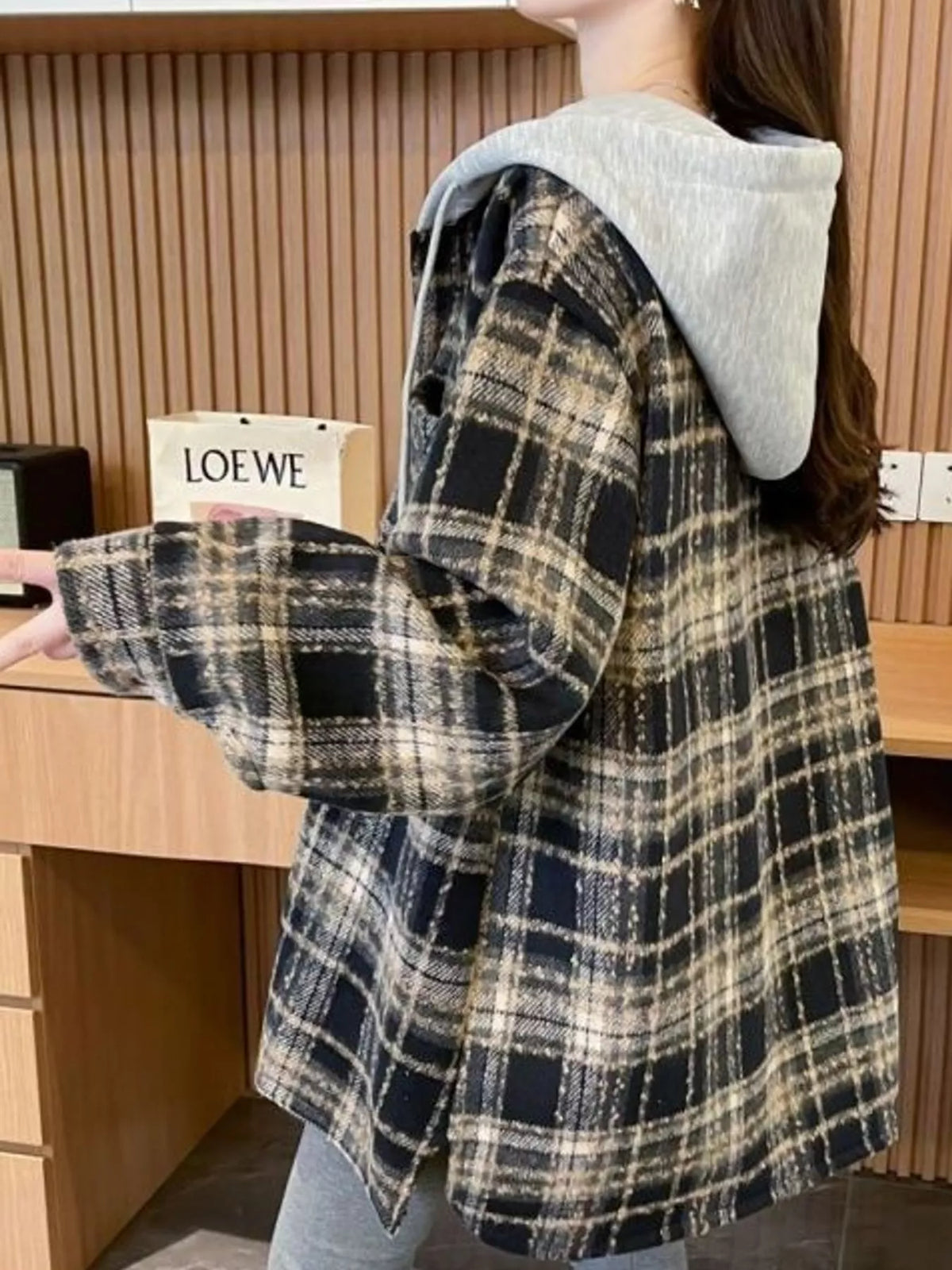 Black plaid button-up hooded shacket, back view