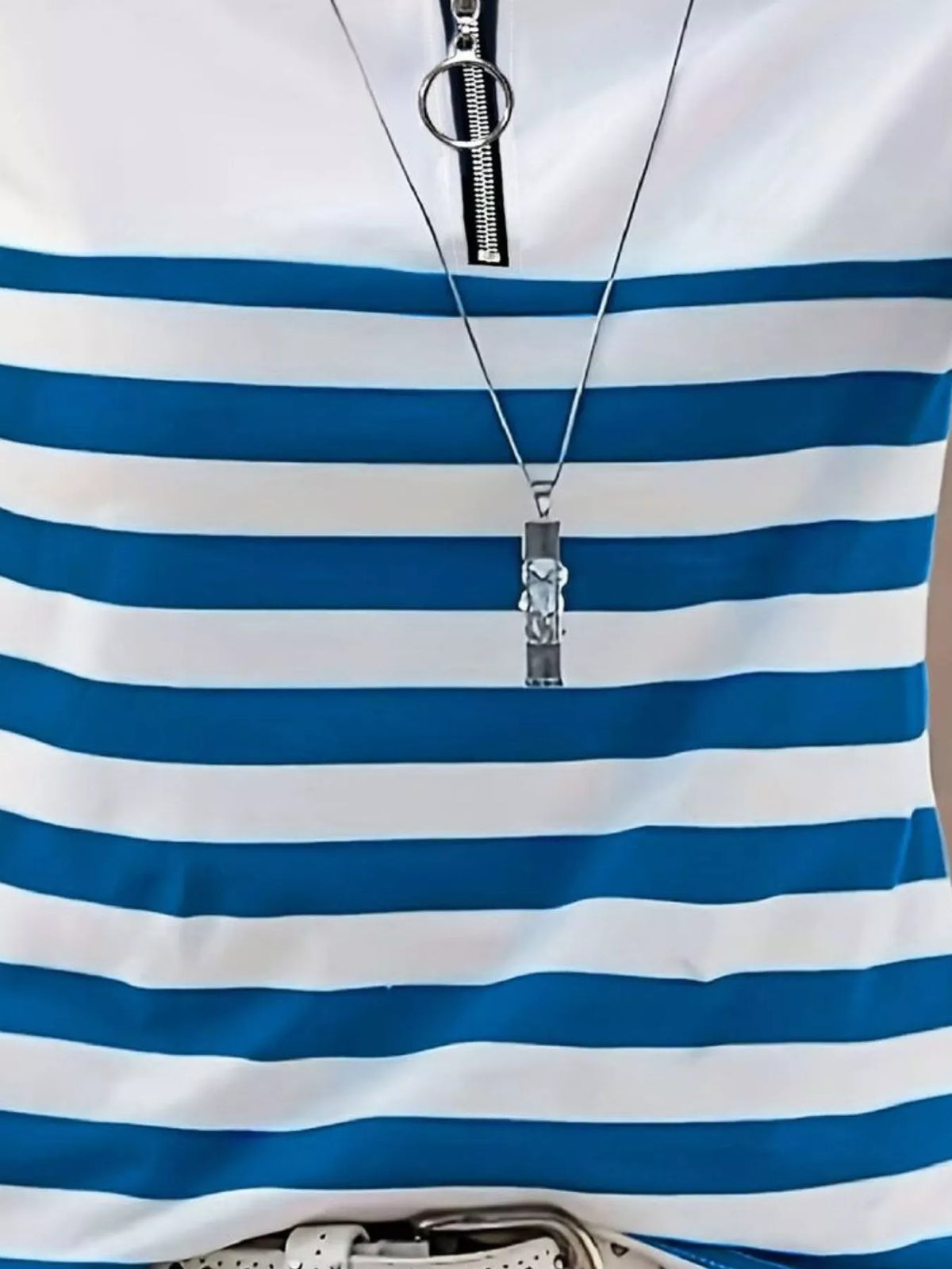 Blue and white quarter-zip striped top, stripe detail