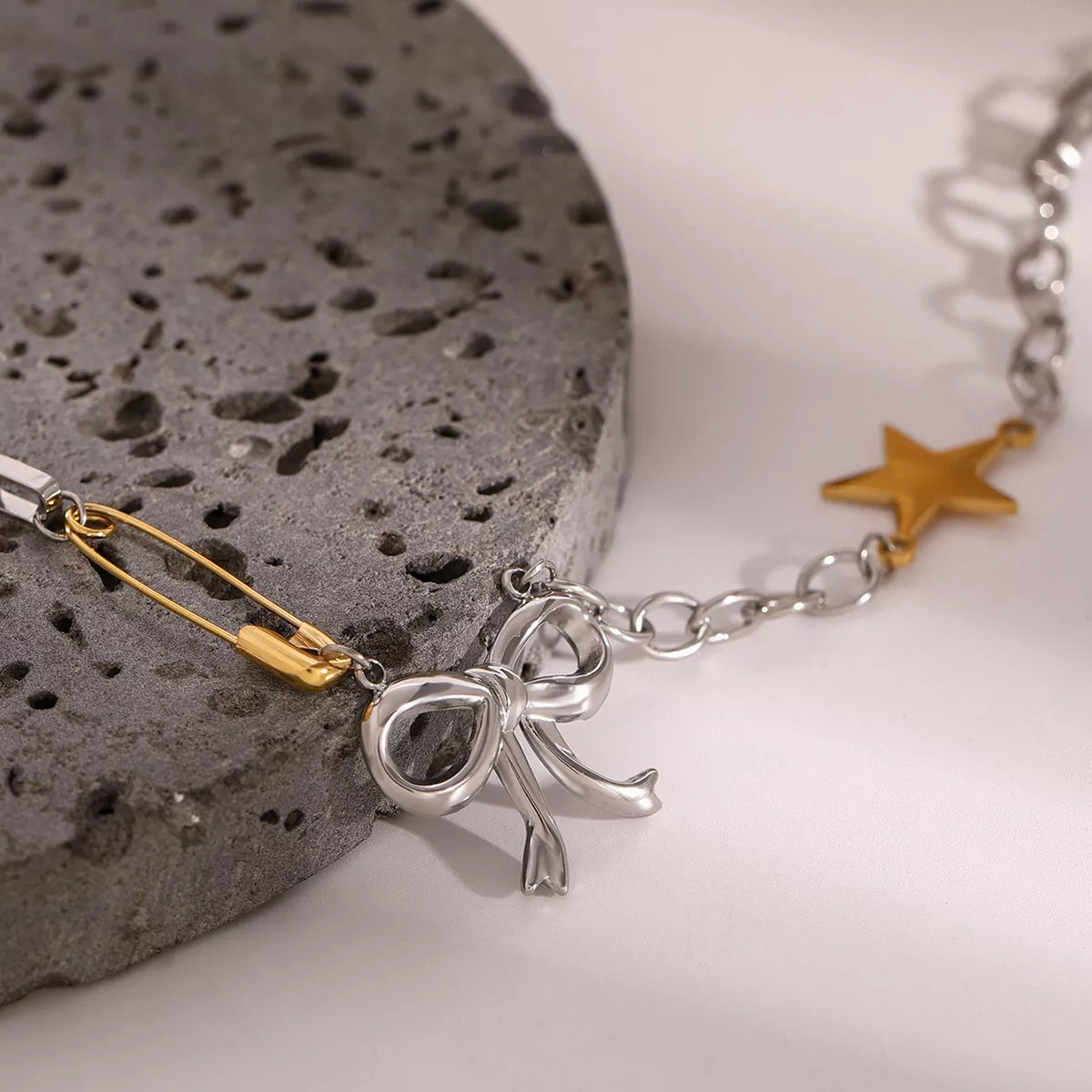 Trendsi Two-Tone Bow Star Necklace -
