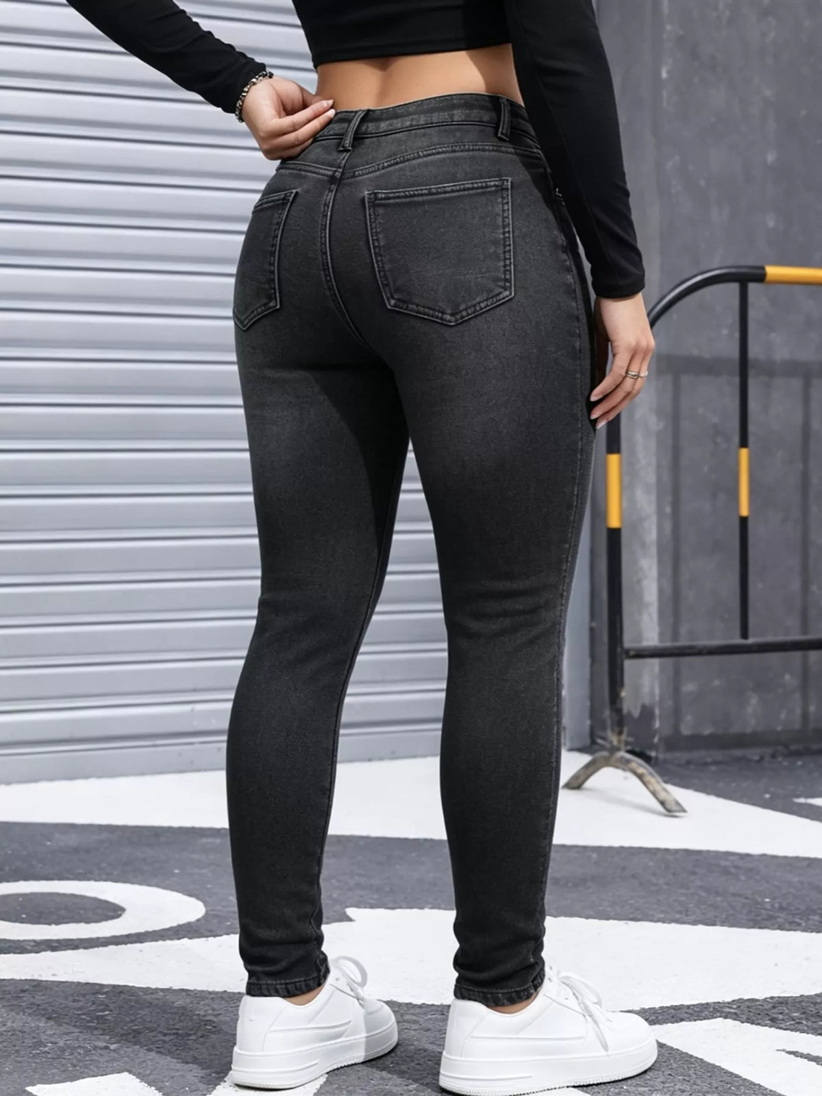 Black Gray high-waisted fleece-lined skinny jeans, back view