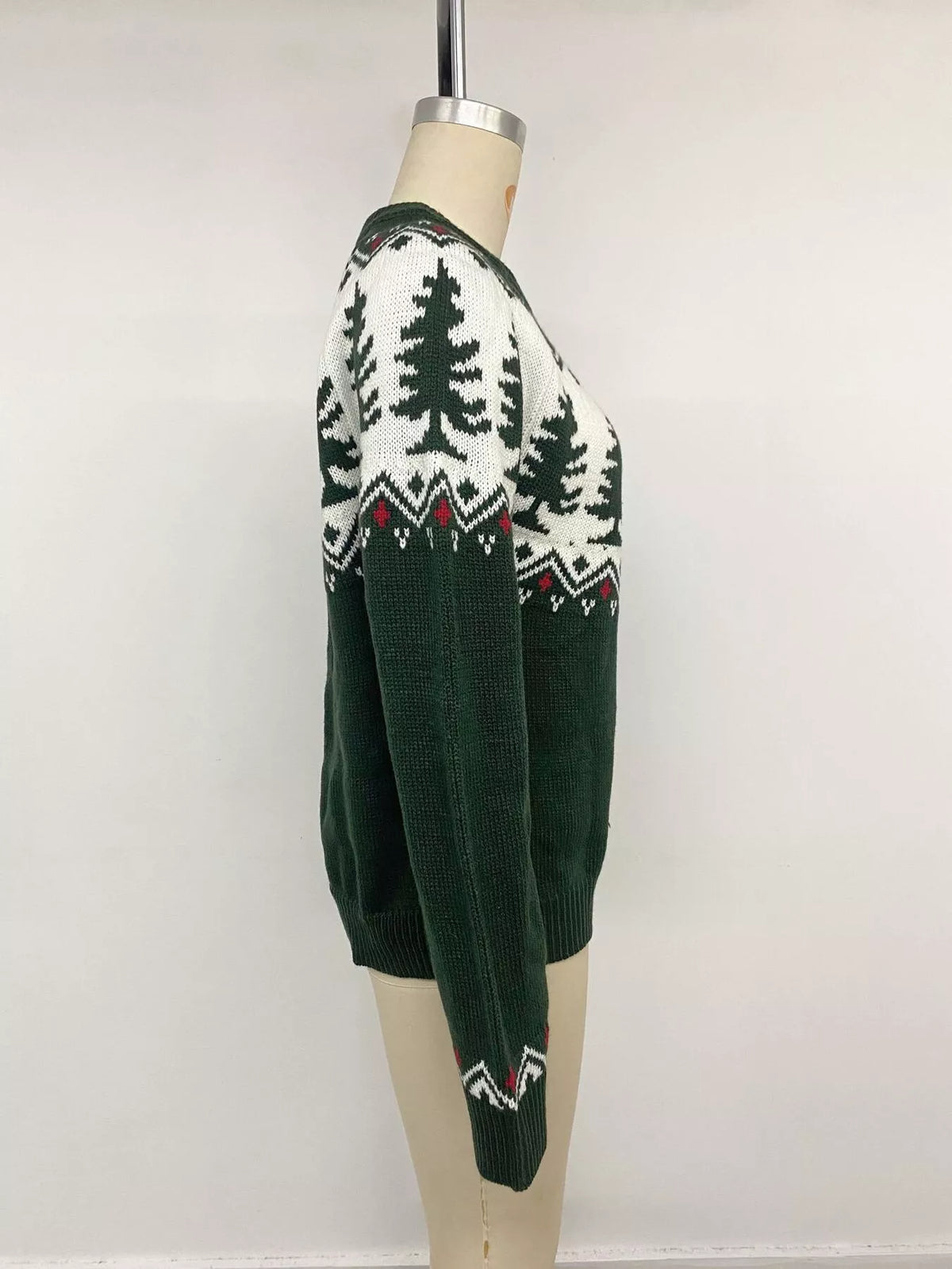 Dark green Christmas tree sweater, side on mannequin