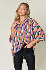 Trendsi Double Take Full Size Geometric Notched Dolman Sleeve Top -