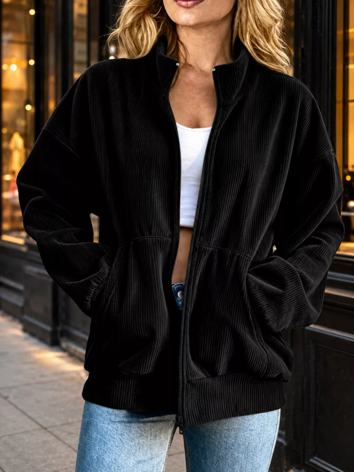 Black corduroy zip-up jacket, front view