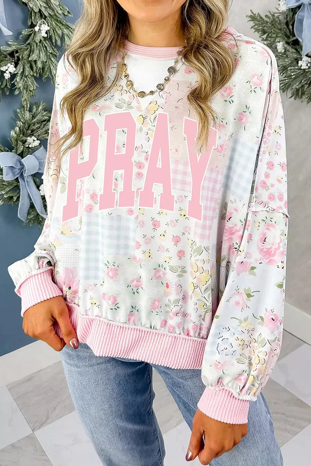 PRAY Floral Patchwork Graphic Sweatshirt in pink and white, front view