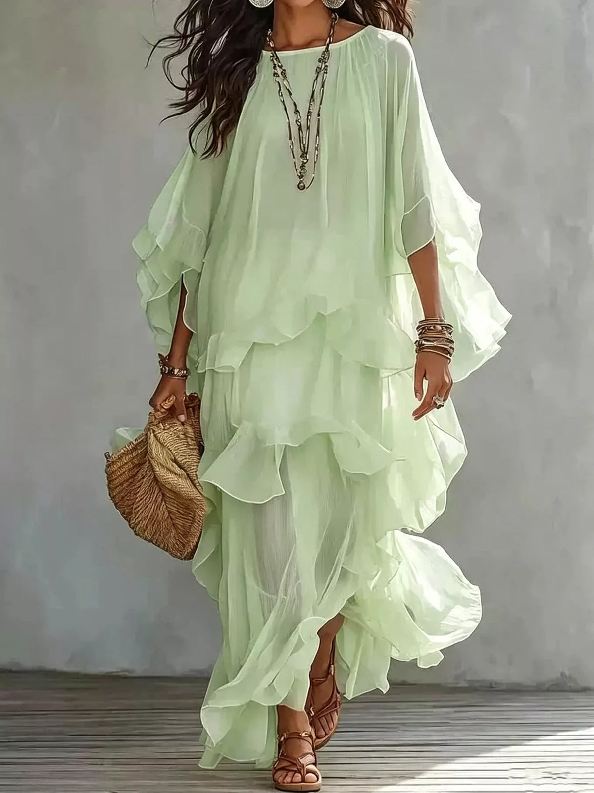 Pale green ruffled layered bohemian maxi dress, front view