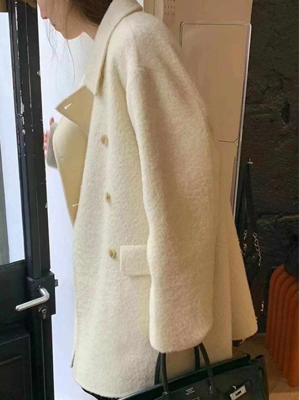 Cream double-breasted wool-blend coat — side view