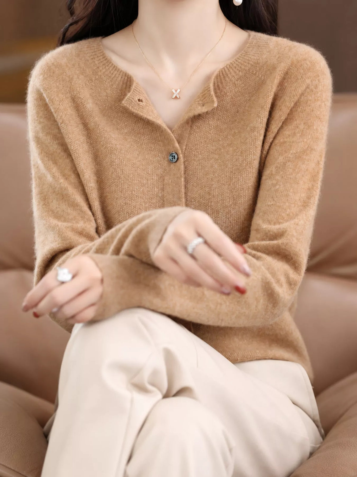 Round neck long sleeve cardigan, front view on model
