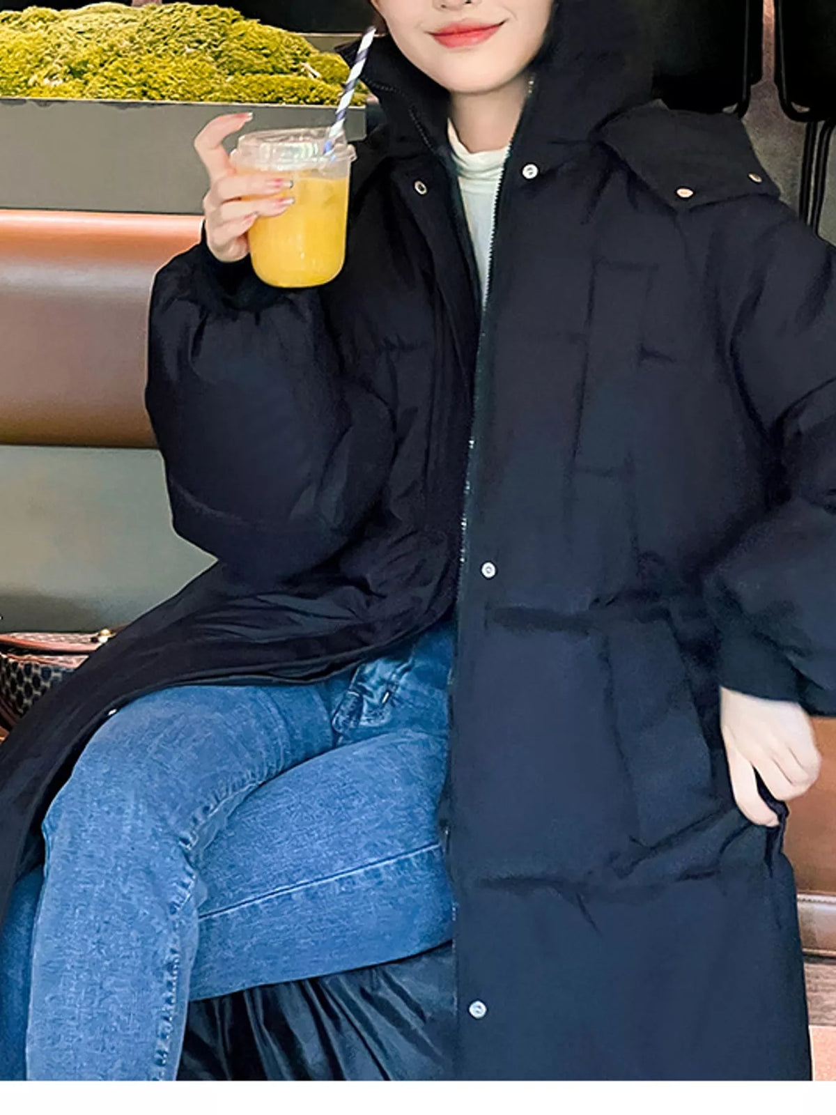 Longline puffer coat, black seated front