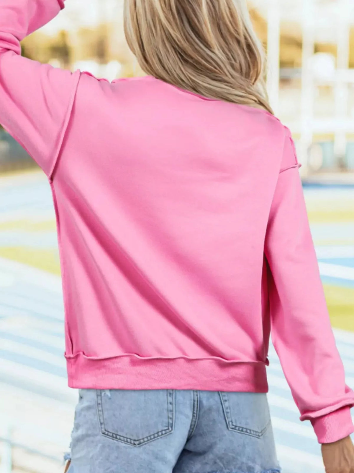 Mock-neck exposed-seam long sleeve sweatshirt