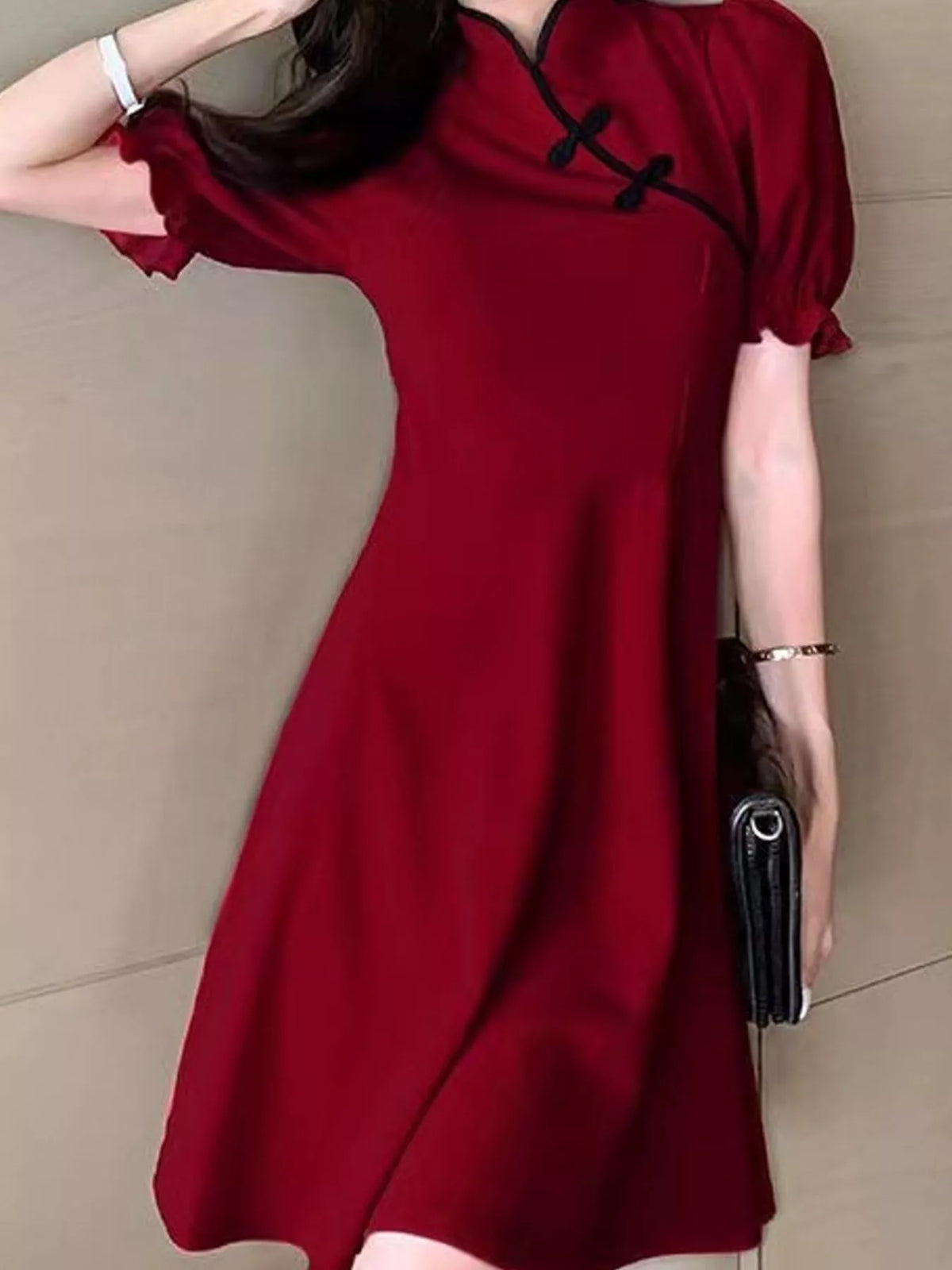Mandarin neck short sleeve mini dress, front view on model