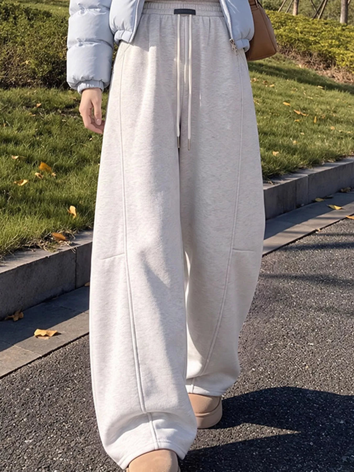 Light gray wide leg drawstring sweatpants, front view